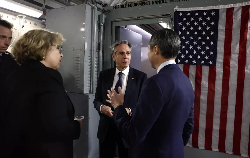 US Secretary of State Antony Blinken talks with Assistant Secretary of State for Near Eastern Affairs Barbara Leaf (2-L), and Spokesperson Matthew Miller (R) aboard a plane after he departed from Manama for Tel Aviv during his week-long trip across the Middle East, on January 10, 2024. Blinken visited the Gulf state of Bahrain, home base of the US Fifth Fleet, for talks with King Hamad on preventing a regional escalation of the war between Israel and Hamas militants in Gaza, the State Department said. (Photo by EVELYN HOCKSTEIN / POOL / AFP)