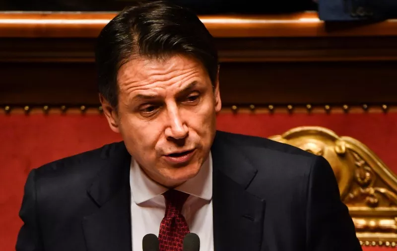 Italian Prime Minister Giuseppe Conte delivers a speech at the Italian Senate, in Rome, on August 20, 2019, as the country faces a political crisis. - Italy's far-right Interior Minister Matteo Salvini was "irresponsible" to spark a political crisis by pulling the plug on the governing coalition, Prime Minister Giuseppe Conte told the Senate. "It is irresponsible to initiate a government crisis," Conte said. "It shows personal and party interests." (Photo by Andreas SOLARO / AFP)