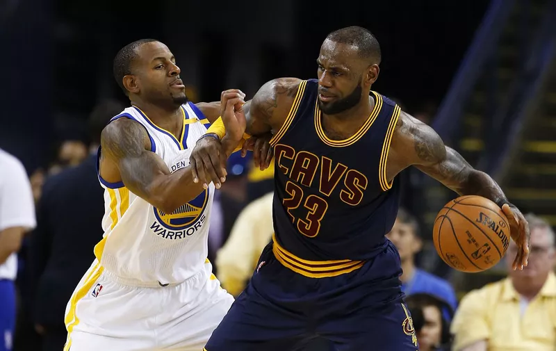 The Golden State Warriors&#8217; Andre Iguodala, left, defends against the Cleveland Cavaliers&#8217; LeBron James (23) in the second quarter in Game 1 of the NBA Finals at Oracle Arena in Oakland, Calif., on Thursday, June 1, 2017. The Warriors won, 113-91., Image: 334448061, License: Rights-managed, Restrictions: NC WEB BL LN, Model Release: no, Credit line: [&hellip;]