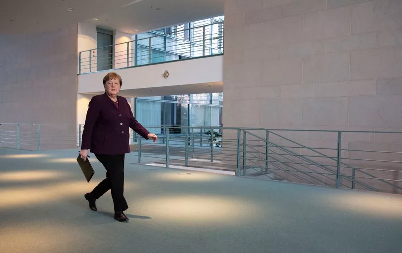 BERLIN, GERMANY - MARCH 16: German Chancellor Angela Merkel arrives to speak to the media at the Chancellery on March 16, 2020 in Berlin, Germany. The German government and local authorities are heightening measures to stem the spread of the coronavirus. Germany has confirmed over 5,000 cases of infection and at least 13 people have died. (Photo by Maja Hitij - Pool/Getty Images)