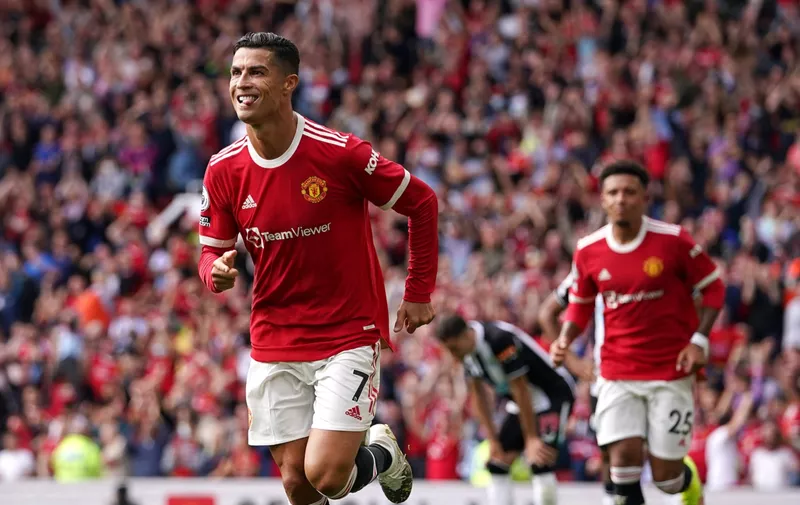 Manchester United, ManU v Newcastle United - Premier League - Old Trafford Manchester United s Cristiano Ronaldo celebrates scoring their side s first goal of the game during the Premier League match at Old Trafford, Manchester. Picture date: Saturday September 11, 2021. EDITORIAL USE ONLY No use with unauthorised audio, video, data, fixture lists, club/league logos or live services. Online in-match use limited to 120 images, no video emulation. No use in betting, games or single club/league/player publications. PUBLICATIONxINxGERxSUIxAUTxONLY Copyright: xMartinxRickettx 62342716