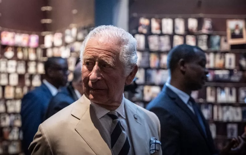 Britain's Prince Charles, Prince of Wales, is seen during a visit of the Kigali Genocide Memorial, Kigali, Rwanda on June 22, 2022 during a visit. - Britain's Prince Charles will take part in the 26th Commonwealth Heads of Government Meeting held in Kigali, Rwanda from the 20 june until the 25 June 2022. (Photo by Simon WOHLFAHRT / POOL / AFP)