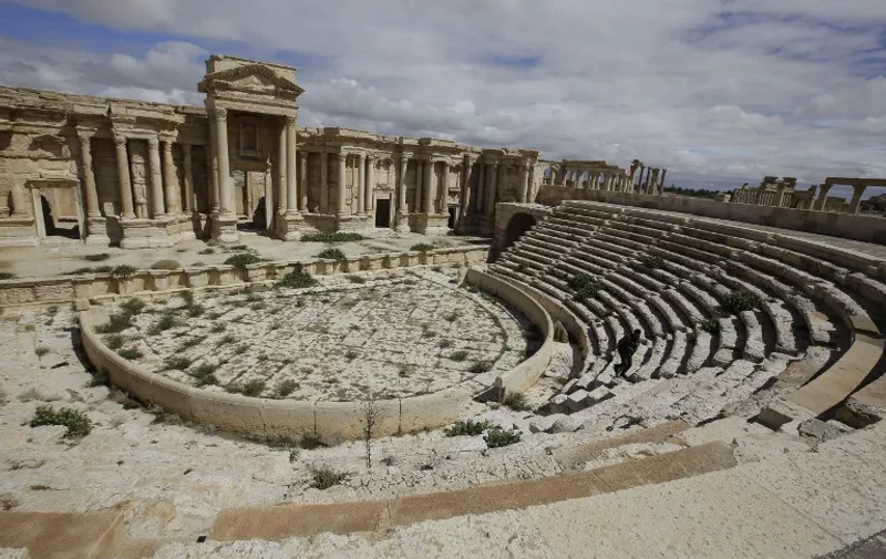 (FILES) - A file picture taken on March 14, 2014 shows a partial view of the theatre at the ancient oasis city of Palmyra, 215 kilometres northeast of Damascus. Islamic State group fighters advanced to the gates of ancient Palmyra on May 14, 2015, raising fears the Syrian world heritage site could face destruction of the kind the jihadists have already wreaked in Iraq. AFP PHOTO / JOSEPH EID