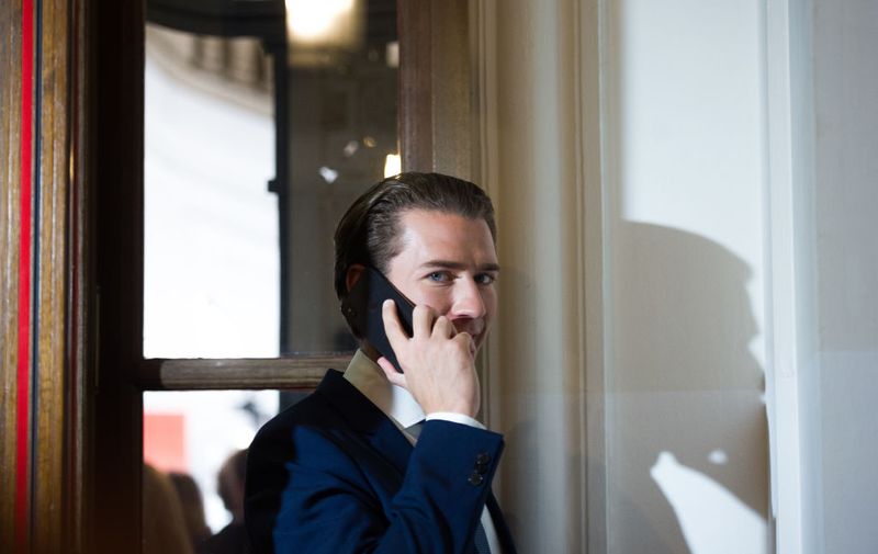 VIENNA, AUSTRIA - SEPTEMBER 29: Former Chancellor Sebastian Kurz of the Austrian People's Party (OeVP) talks on the phone at Hofburg before a television interview following elections to the National Council on September 29, 2019 in Vienna, Austria. Both the OeVP and the Austrian Greens finished with strong gains while the FPOe fell sharply, paving the way for a possible OeVP/Greens coalition government. The elections are taking place following the so-called Ibiza affair, which brought down then Vice-Chancellor and leader of the FPOe, Heinz-Christian Strache, but also eventually led to the dissolution of the entire government. (Photo by Michael Gruber/Getty Images)