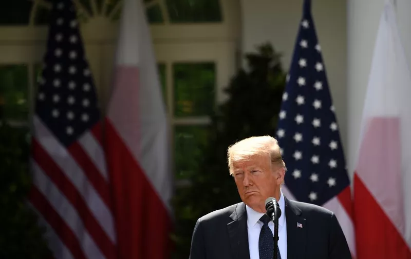 US President Donald Trump looks on during a joint press conference with Polish President Andrzej Duda (out of frame)  in the Rose Garden of the White House in Washington, DC, June 24, 2020. (Photo by SAUL LOEB / AFP)