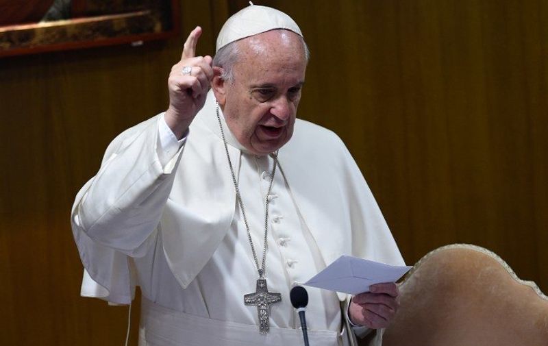 Pope Francis gestures as he speaks during the morning session of the last day of the Synod on the Family at the Vatican on October 24, 2015. Pontiff on October 4 defended marriage and heterosexual couples as he opened a synod on the family overshadowed by a challenge to Vatican. Pope Francis accelerated his streamlining of the Vatican bureaucracy by announcing plans to create a new ministry which will increase the role of lay believers in the Church. The Pontiff made the announcement to an afternoon session of the synod, which is due to conclude at the weekend after three weeks of often heated discussions on issues such as divorce, homosexuality and cohabitation. AFP PHOTO / ANDREAS SOLARO