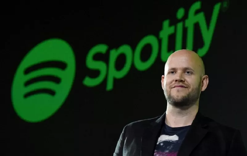 Daniel Ek, CEO of Swedish music streaming service Spotify, poses for photographers at a press conference in Tokyo on September 29, 2016. - Spotify kicked off its services in Japan on September 29. (Photo by TORU YAMANAKA / AFP)
