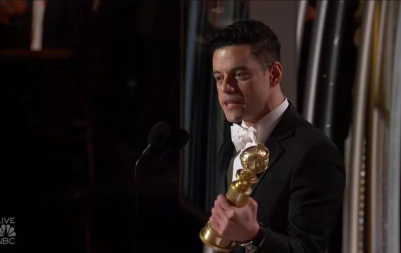 BGUK_1449758 - ** RIGHTS: WORLDWIDE EXCEPT IN UNITED STATES ** Los Angeles, CA  - Rami Malek thanks Freddie Mercury and Queen in his Golden Globes Best Actor acceptance speech. Malek took home the Golden Globe for Best Performance by an Actor in a Drama Film on  for his role as Freddie Mercury in Bohemian Rhapsody. The actor beat out Bradley Cooper in A Star is Born, John David Washington in BlacKkKlansman, Lucas Hedges in Boy Erased and Willem Dafoe in At Eternity's Gate. "Oh my god, I am beyond moved," Malek said at the podium - after hugging Queen band members Brian May and Roger Taylor after he was announced as the winner. Malek added: "My heart is pounding out of my chest. This is a profound honor to be counted among such extraordinary actors, I am privileged. Thank you to the Hollywood Foreign Press and to everyone who worked so tirelessly on this film. I have to thank producers Graham King and Denis O'Sullivan, you've worked over a decade to make sure this story was told. Thank you to 20th Century Fox, you believed in us. I have to thank my mom and my family. Of course, to Queen. To you, Brian May, to you, Roger Taylor, for ensuring that authenticity remains in the world. And to Freddie Mercury, this is for you. Thank you to Freddie for giving me the joy of a lifetime. I love you, you beautiful man. This is for and because of you, gorgeous."  Bohemian Rhapsody also won the Globe for best film - drama, ending the awards ceremony with two major wins.

*BACKGRID DOES NOT CLAIM ANY COPYRIGHT OR LICENSE IN THE ATTACHED MATERIAL. ANY DOWNLOADING FEES CHARGED BY BACKGRID ARE FOR BACKGRID'S SERVICES ONLY, AND DO NOT, NOR ARE THEY INTENDED TO, CONVEY TO THE USER ANY COPYRIGHT OR LICENSE IN THE MATERIAL. BY PUBLISHING THIS MATERIAL , THE USER EXPRESSLY AGREES TO INDEMNIFY AND TO HOLD BACKGRID HARMLESS FROM ANY CLAIMS, DEMANDS, OR CAUSES OF ACTION ARISING OUT OF OR CONNECTED IN ANY WAY WITH USER'S PUBLICATION OF THE MATERIAL*

Pictured: Rami Malek

BACKGRID UK 6 JANUARY 2019, Image: 405648716, License: Rights-managed, Restrictions: , Model Release: no, Credit line: Profimedia, Xposurephotos