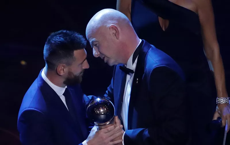 Argentinian Barcelona player Lionel Messi receives the Best FIFA mens player award from FIFA president Gianni Infantino during the ceremony of the Best FIFA Football Awards, in Milan's La Scala theater, northern Italy, Monday, Sept. 23, 2019. (AP Photo/Antonio Calanni)