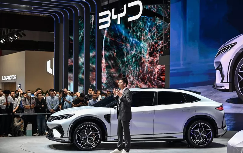 Fan Jihan, Deputy director of Exterior design of BYD Global Design Center, gives a speech during the presentation of BYD new cars at the 20th Shanghai International Automobile Industry Exhibition in Shanghai on April 18, 2023. (Photo by Hector RETAMAL / AFP)