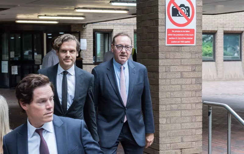 LONDON, UNITED KINGDOM - JUNE 28: US actor Kevin Spacey (R) leaves the Southwark Crown Court following the first day of his trial on sexual assault charges in London, United Kingdom on June 28, 2023. The Oscar-winning actor has pleaded not guilty to the 12 charges including sexual assault, indecent assault, and causing a person to engage in sexual activity without consent against four different men which allegedly took place in London and Gloucestershire between 2001 and 2013. Wiktor Szymanowicz / Anadolu Agency (Photo by Wiktor Szymanowicz / ANADOLU AGENCY / Anadolu Agency via AFP)