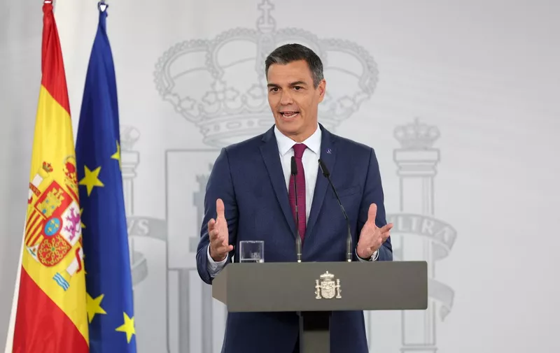 Spain's acting Prime Minister Pedro Sanchez gestures during a press conference after meeting with the King as part of the round of consultations with political representatives aiming at proposing a candidate for the investiture, at La Moncloa Palace in Madrid on August 22, 2023. Spain's King began meeting party leaders in a bid to break an impasse over the formation of a new government following inconclusive elections last month. Acting Prime Minister tries to win an investiture vote in parliament -- which determines who forms the government -- with the support of its far-left partner Sumar and smaller regional parties, including Catalonia's separatists. (Photo by Pierre-Philippe MARCOU / AFP)