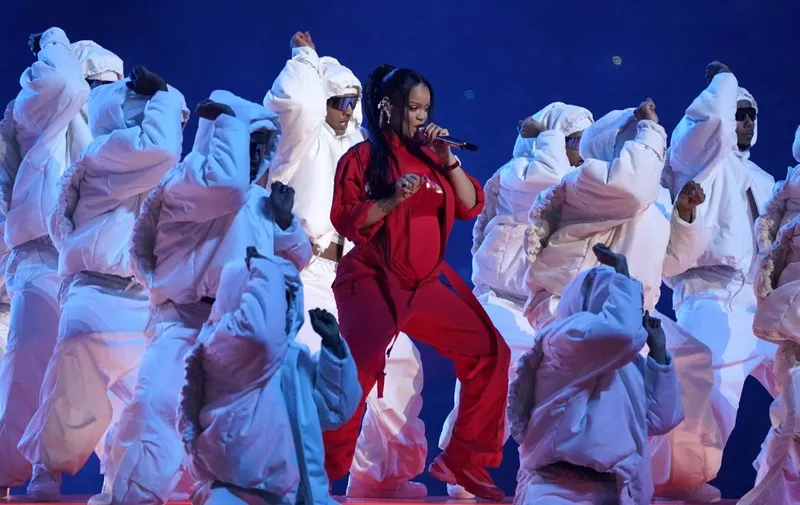 Barbadian singer Rihanna performs during the halftime show of Super Bowl LVII between the Kansas City Chiefs and the Philadelphia Eagles at State Farm Stadium in Glendale, Arizona, on February 12, 2023. (Photo by TIMOTHY A. CLARY / AFP)
