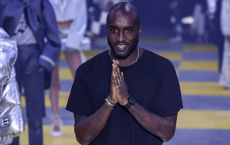US fashion designer for Off-White Virgil Abloh acknowledges the audience at the end of the Off-White Women's Fall-Winter 2019/2020 Ready-to-Wear collection fashion show in Paris, on February 28, 2019. (Photo by Philippe LOPEZ / AFP)