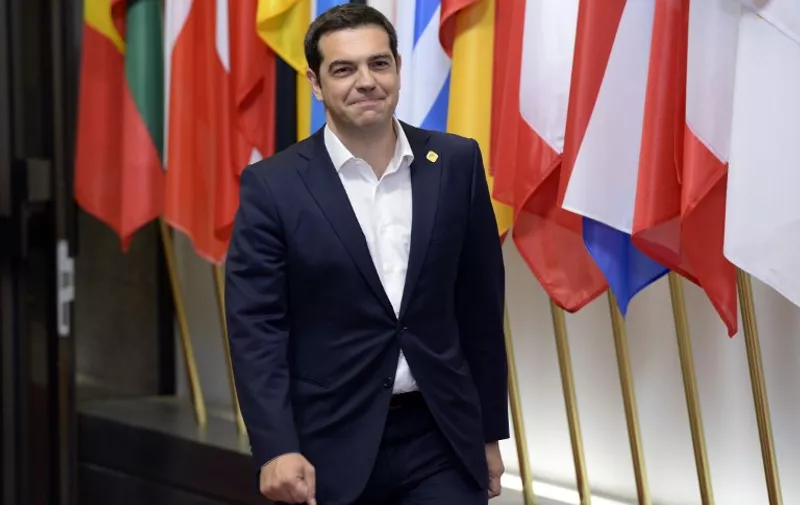 The Prime Minister of Greece Alexis Tsipras is seen leaving at the end of a Special EU Euro Summit about the Greek crisis held at the EU Council building in Brussels on  June 23, 2015.  AFP Photo / Thierry Charlier