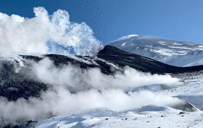 KAMCHATKA TERRITORY, RUSSIA - MARCH 10, 2021: Seen in this video grab is an eruption of Klyuchevskaya Sopka, a stratovolcano in Kamchatka, on Russia's Pacific coast. On 18 February 2021, the formation of two parallel fissures occurred on the side of the volcano, with about 250 metres between them. Video grab. Boris Smirnov/TASS,Image: 596453206, License: Rights-managed, Restrictions: , Model Release: no
