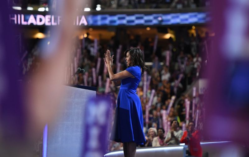 US First Lady Michelle Obama addresses delegates on Day 1 of the Democratic National Convention at the Wells Fargo Center in Philadelphia, Pennsylvania, July 25, 2016. / AFP PHOTO / Timothy A. CLARY