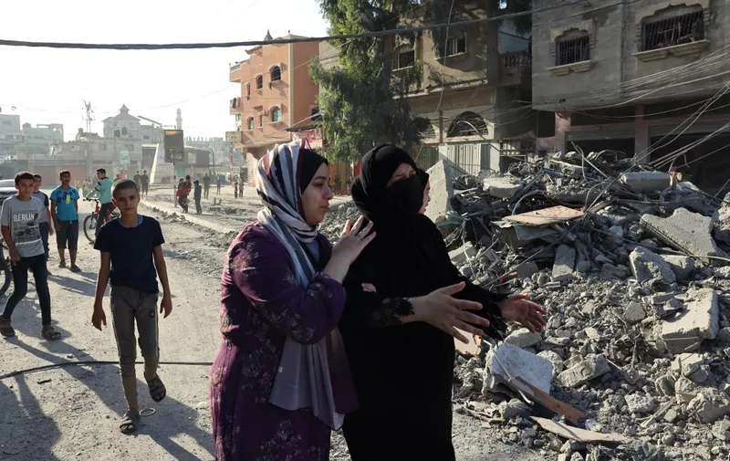EDITORS NOTE: Graphic content / Palestinian women react after an Israeli bombardment in Rafah in the southern Gaza Strip on November 7, 2023, amid continuing battles between Israel and the Palestinian militant group Hamas. (Photo by MOHAMMED ABED / AFP)