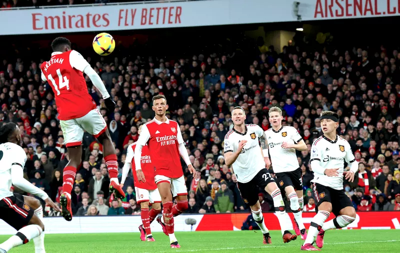 Arsenal's Eddie Nketiah, second left, scores his side's opening goal during the English Premier League soccer match between Arsenal and Manchester United at Emirates stadium in London, Sunday, Jan. 22, 2023. (AP Photo/Ian Walton)