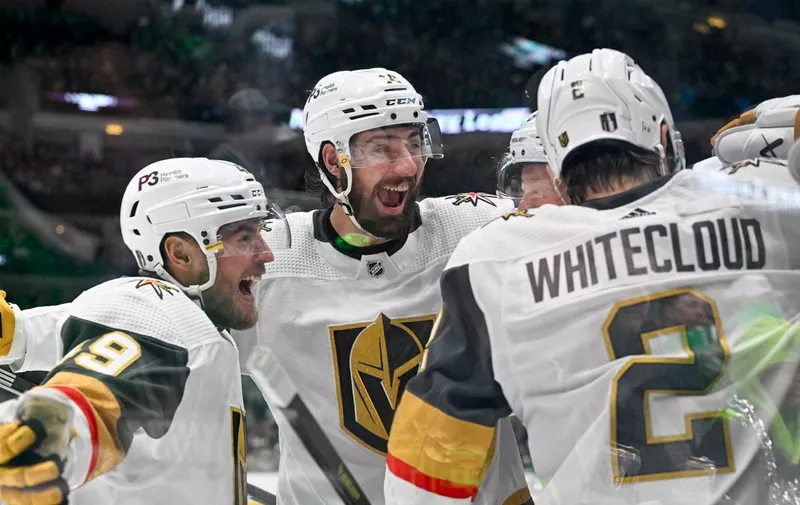 May 29, 2023; Dallas, Texas, USA; Vegas Golden Knights center Ivan Barbashev (49) and defenseman Nicolas Hague (14) and defenseman Zach Whitecloud (2) celebrates a goal scored by right wing Jonathan Marchessault (not pictured) against the Dallas Stars during the second period in game six of the Western Conference Finals of the 2023 Stanley Cup Playoffs at American Airlines Center. Mandatory Credit: Jerome Miron-USA TODAY Sports