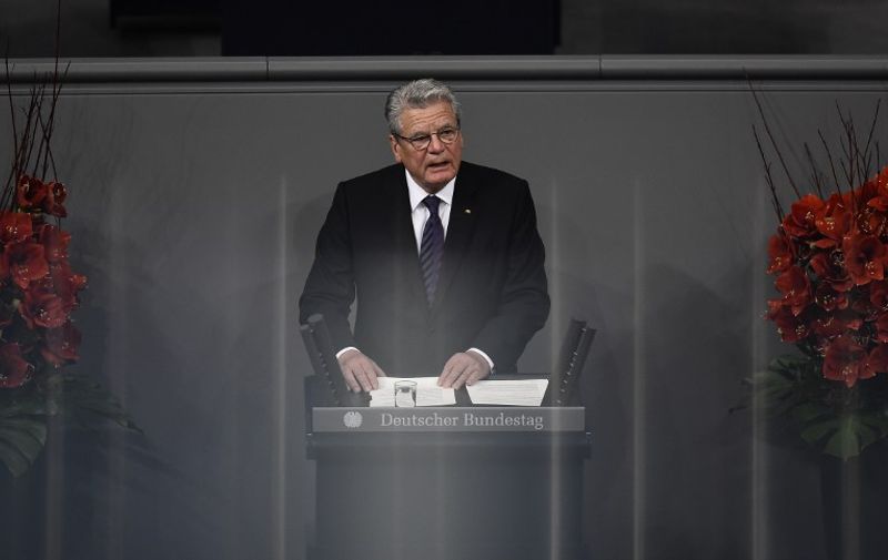 Germany's President Joachim Gauck delivers a speech at the Lower house of Parliament during the annual homage session for war victims in Berlin, on November 15, 2015. Gauck says the world faces "a new type of war" after Paris attacks.  AFP PHOTO / TOBIAS SCHWARZ