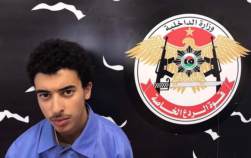 A photo released on the Facebook page of Libya's Ministry of Interior's Special Deterrence Force on May 24, 2017 claims to shows Hashem Abedi, the brother of the man suspected of carrying out the bombing in the British city of Manchester, after he was detained in Tripoli for alleged links to the Islamic State (IS) group. - Libya arrested a brother and father of Salman Abedi who is suspected of the bombing at a pop concert killing 22 people, including children on May 22, 2017. (Photo by HO / LIBYA'S SPECIAL DETERRENCE FORCE / AFP) / RESTRICTED TO EDITORIAL USE - MANDATORY CREDIT "AFP PHOTO / LIBYA'S SPECIAL DETERRENCE FORCE" - NO MARKETING NO ADVERTISING CAMPAIGNS - DISTRIBUTED AS A SERVICE TO CLIENTS