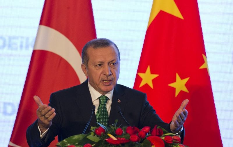 Turkish President Recep Tayyip Erdogan speaks at the Turkey-China Business Forum in Beijing on July 30, 2015. AFP PHOTO / POOL