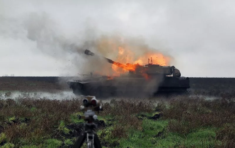 A Ukrainian army 2S1 Gvozdika self-propelled howitzer fires a shell on the front line in Donetsk region on October 10, 2022 as Russian forces launched earlier today at least 75 missiles at Ukraine, with fatal strikes targeting the capital Kyiv, and cities in the south and west. (Photo by Anatolii STEPANOV / AFP)