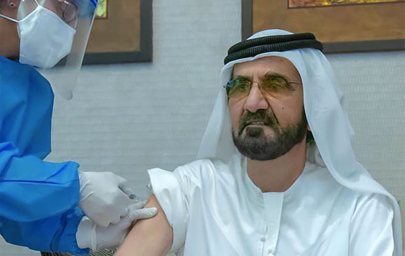A handout image provided by United Arab Emirates News Agency (WAM) on November 3, 2020 shows Dubai's Ruler and UAE Vice President Sheikh Mohammed bin Rashid Al-Maktoum receiving an injection of a COVID-19 coronavirus vaccine. Dubai's ruler has received an experimental coronavirus vaccine, according to his Twitter account on November 3, as global cases remain on the rise. Sheikh Mohammed -- who is also prime minister of the United Arab Emirates -- is the latest in a string of Gulf officials who have been injected by an experimental drug that could help bring the pandemic to an end. Chinese drug giant Sinopharm began the third phase of trials for a Covid-19 vaccine in the United Arab Emirates in July, with Emirati officials saying the results have been positive.,Image: 567142832, License: Rights-managed, Restrictions: === RESTRICTED TO EDITORIAL USE - MANDATORY CREDIT "AFP PHOTO / HO / WAM" - NO MARKETING NO ADVERTISING CAMPAIGNS - DISTRIBUTED AS A SERVICE TO CLIENTS ===
ALTERNATIVE CROP, Model Release: no