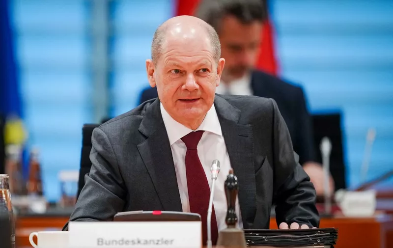 German Chancellor Olaf Scholz has taken seat to lead the weekly cabinet meeting at the Chancellery in Berlin on March 30, 2022. (Photo by Kay Nietfeld / POOL / AFP)