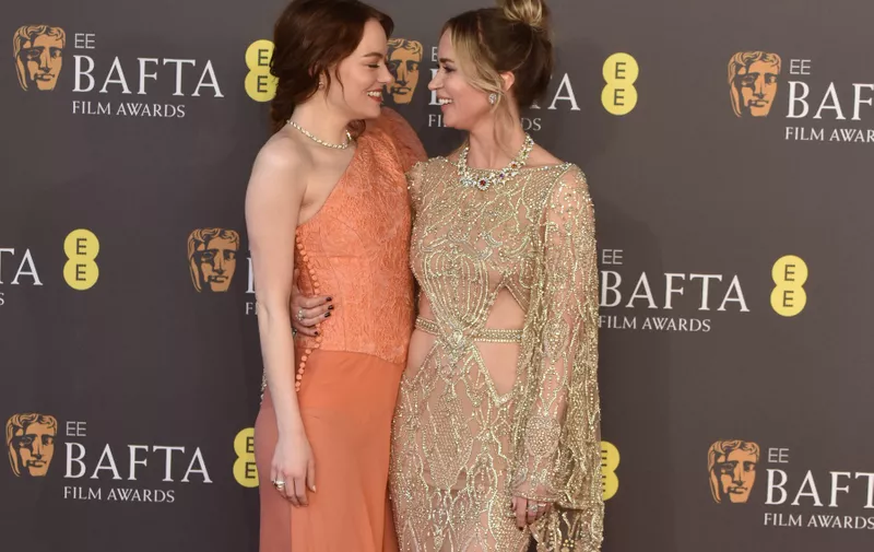 Emma Stone and Emily Blunt attends the 2024 EE BAFTA Film Awards at the Royal Festival Hall in London, England. UK. Sunday 18th February 2024 - BANG MEDIA INTERNATIONAL FAMOUS PICTURES 28 HOLMES ROAD LONDON NW5 3AB UNITED KINGDOM tel 44 0 02 7485 1005 email: picturesfamous.uk.com Copyright: xJamesxWarrenx adplr852,Image: 848221482, License: Rights-managed, Restrictions: imago is entitled to issue a simple usage license at the time of provision. Personality and trademark rights as well as copyright laws regarding art-works shown must be observed. Commercial use at your own risk., Credit images as "Profimedia/ IMAGO", Model Release: no