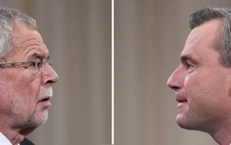 (FILES) This file combo of 2 photos taken on November 27, 2016 shows shows Alexander Van der Bellen (L) candidate for presidential elections of the Austrian Greens and Norbert Hofer (R), candidate of Austria's right-wing Freedom Party, FPOE, speaking to each other during a television debate in Vienna, Austria on November 27, 2016.
Austria will hold the postponed second round of the presidential elections on December 4, 2016. / AFP PHOTO / JOE KLAMAR