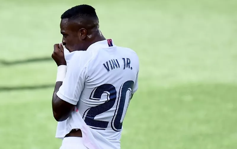 Real Madrid's Brazilian forward Vinicius Junior celebrates his goal during the Spanish League football match between Levante UD and Real Madrid CF at La Ceramica stadium in Vila-real on October 4, 2020. (Photo by JOSE JORDAN / AFP)