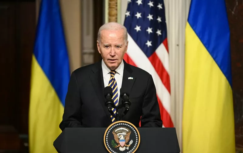 US President Joe Biden speaks during a joint press conference with Ukraines President Volodymyr Zelensky in a in the Indian Treaty Room of the Eisenhower Executive Office Building, next to the White House, in Washington, DC, on December 12, 2023. (Photo by Mandel NGAN / AFP)