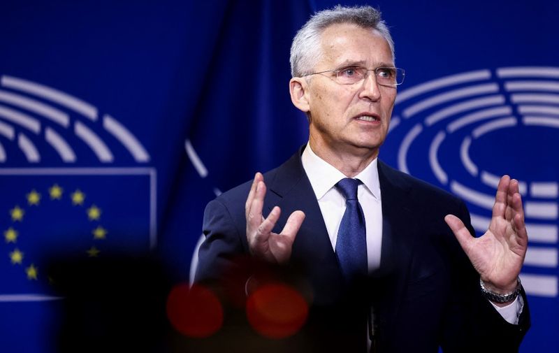 NATO Secretary General Jens Stoltenberg holds a press conference along with the European Parliament president at the European Parliament in Brussels on April 28, 2022. (Photo by Kenzo TRIBOUILLARD / AFP)