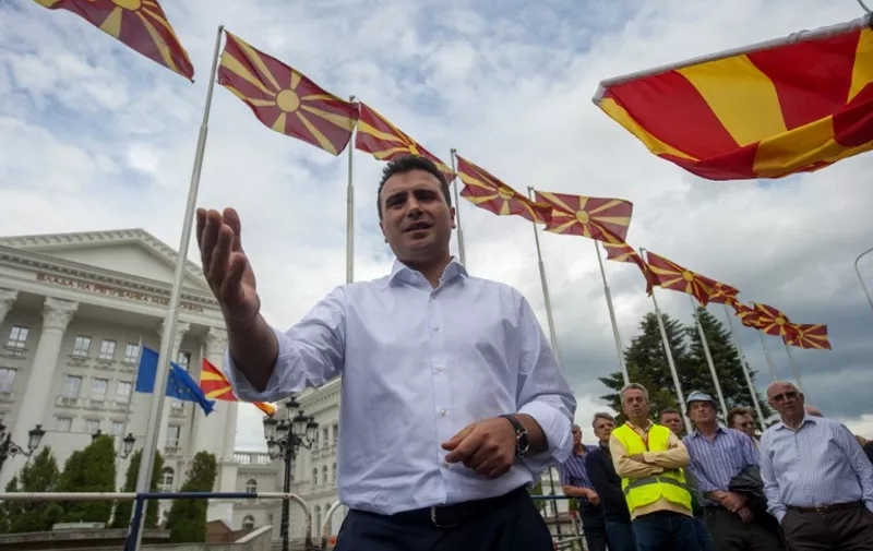 Macedonian opposition leader Zoran Zaev adresses to media in front of the Macedonian Government building in Skopje on May 27,2015, where a small camp is set up by demonstrators demanding a resignation from the Prime minister. AFP  PHOTO / ROBERT ATANASOVSKI