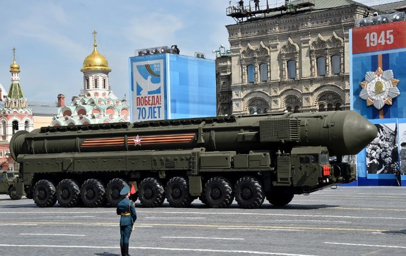 A Russian Yars RS-24 intercontinental ballistic missile system drives through Red Square during the Victory Day military parade in Moscow on May 9, 2015. Russian President Vladimir Putin presided over a huge Victory Day parade celebrating the 70th anniversary of the Soviet win over Nazi Germany, amid a Western boycott of the festivities over the Ukraine crisis. AFP PHOTO / KIRILL KUDRYAVTSEV