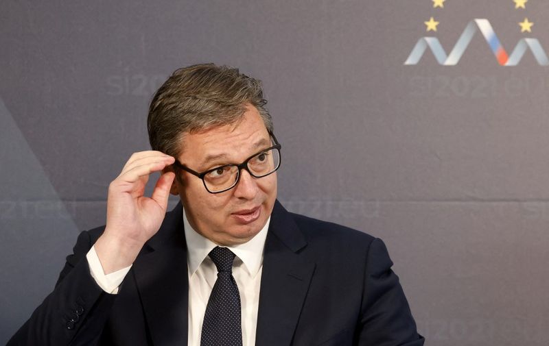 Serbia's President Aleksandar Vucic gestures as he attends a press conference at the end of the EU-Western Balkans summit in Brdo Congress Centre, near Ljubljana on October 6, 2021. - Western Balkan countries can expect reassurances but no concrete progress on their stalled bids for European Union membership when EU leaders meet today. (Photo by Ludovic MARIN / AFP)