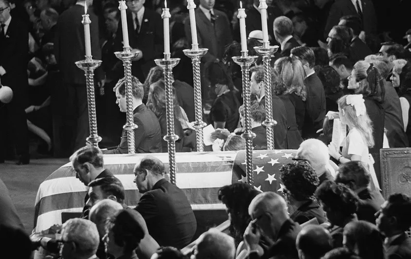 His relatives surround Senator Robert F. Kennedy's coffin in Saint Patrick cathedral in New York 08 June 1968. Bob Kennedy who was shot in the head 5 June at the Ambassador Hotel of Los Angeles will be buried next to his brother John F. Kennedy at the Arlington cemetery. (Photo by AFP)