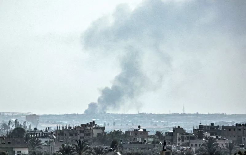 A smoke plume billows following Israeli bombardment north of Nuseirat in the central Gaza Strip on April 23, 2024 amid the ongoing conflict in the Palestinian territory between Israel and the militant group Hamas. (Photo by AFP)