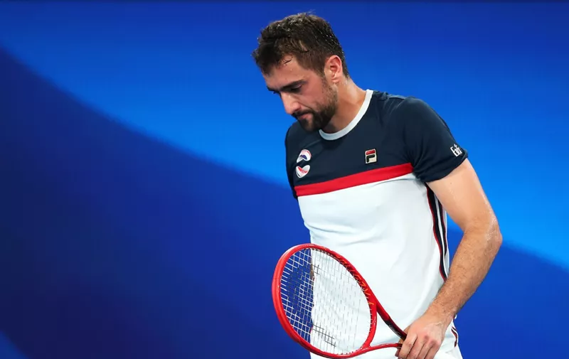 SYDNEY, AUSTRALIA - JANUARY 04: Marin Cilic of Croatia looks dejected during his group E singles match against Dennis Novak of Austria during day two of the 2020 ATP Cup Group Stage at Ken Rosewall Arena on January 04, 2020 in Sydney, Australia. (Photo by Cameron Spencer/Getty Images)