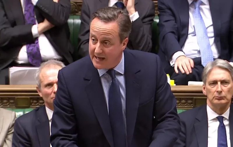 A video grab taken from footage broadcast by the UK Parliament's Parliamentary Recording Unit (PRU) shows British Prime Minister David Cameron as he addresses MPs in the House of Commons in London on February 3, 2016.
Cameron urged MPs to unite behind his drive to agree a series of European Union reforms at a Brussels summit next month ahead of Britain's EU membership referendum. "Let's fight this together," Cameron said as he defended a series of draft proposals put forward by the European Council president on Tuesday that have angered eurosceptics from his own Conservative Party.
 / AFP / PRU / - / RESTRICTED TO EDITORIAL USE - MANDATORY CREDIT " AFP PHOTO / PRU " - NO MARKETING NO ADVERTISING CAMPAIGNS - NO RESALE - NO DISTRIBUTION TO THIRD PARTIES - 24 HOURS USE - NO ARCHIVES