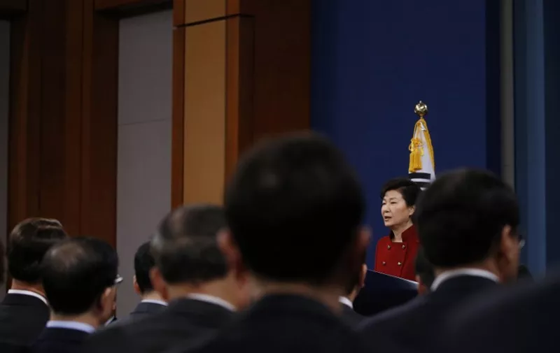 South Korea's President Park Geun-hye (back R) addresses the nation at the Presidential Blue House in Seoul on January 13, 2016. Park on January 13 urged the international community, and in particular China, to ensure that North Korea receives the strongest possible punishment for its latest nuclear test.       AFP PHOTO / POOL / Kim Hong-Ji / AFP PHOTO / POOL / Kim Hong-Ji