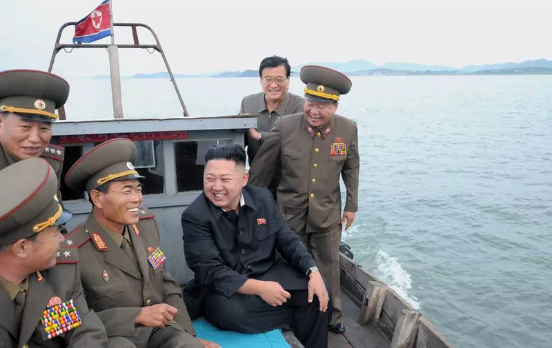 Kim Jong Un (C), top leader of the Democratic People's Republic of Korea (DPRK), inspects the unit of the Korean People's Army (KPA) on the DRPK's border Mu Islet on the southwest front in this photo released by DPRK's official news agency KCNA on Aug. 19, 2012. Kim Jong Un inspected a front-line artillery unit days before Seoul and Washington are to launch their annual joint exercises, state media reported on Saturday. /Credit:KCNA/CHINE NOUVELLE/SIPA/1208191501, Image: 231184274, License: Rights-managed, Restrictions: , Model Release: no, Credit line: KCNA/CHINE NOUVELLE / Sipa Press / Profimedia
