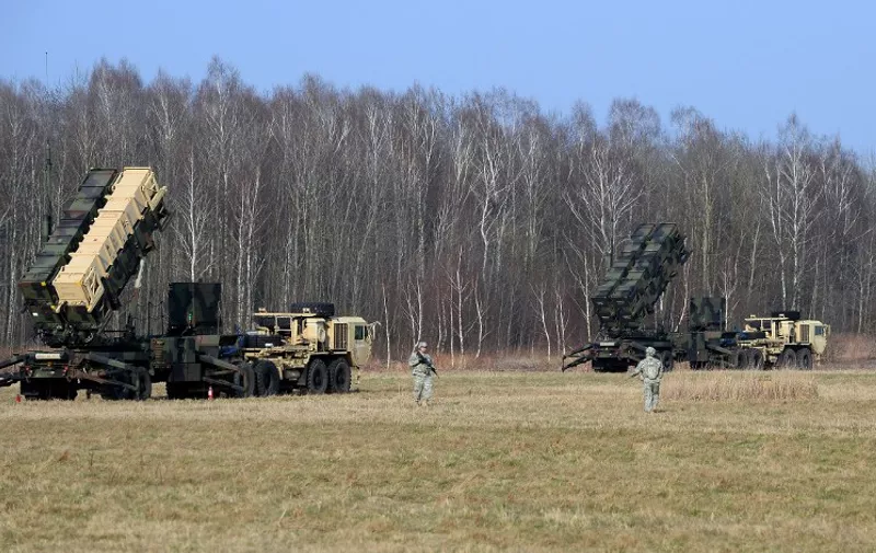 (FILES) This picture taken on March 21, 2015 shows US troops from the 5th Battalion of the 7th Air Defense Regiment emplace a launching station of the Patriot air and missile defence system at a test range in Sochaczew, Poland, as part of a joint exercise with Polands troops of the 37th Missile Squadron of [&hellip;]