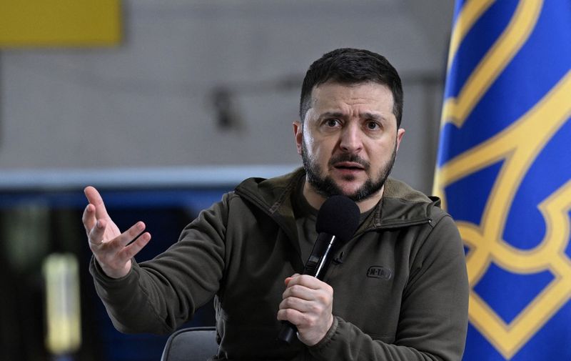 Ukrainian President Volodymyr Zelensky addresses a press conference with international media in an underground metro station in Kyiv on April 23, 2022. - Zelensky criticised a decision by UN Secretary Generalto visit Moscow on April 26, before heading to Kyiv. (Photo by Genya SAVILOV / AFP)