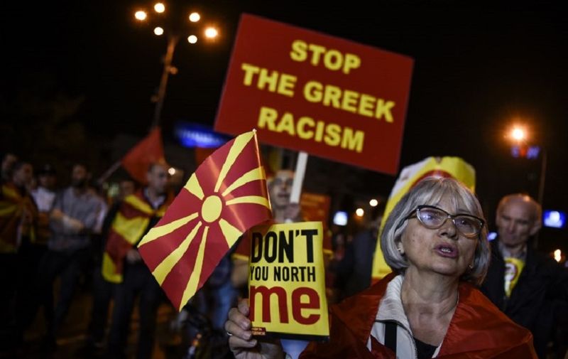 Supporters of a boycott for the name-change referendum celebrate in front of the Parliament in Skopje on September 30, 2018, as the vote was marred by a low turnout, with only a third of the electorate voting.
The vast majority of voters supported the plan to rename the country and thereby end a decades-long spat with Greece, partial results showed. With ballots from 43 percent of polling stations counted, 90.72 percent of votes were in favour of the name changing to North Macedonia, compared to 6.26 percent opposing the move, according to the electoral commission's official count.
 / AFP PHOTO / Armend NIMANI