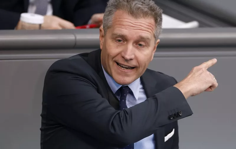 German MP Petr Bystron of the right-wing Alternative for Germany (AfD) addresses a session of the Bundestag, Germany's lower house of parliament, on the delivery of battle tanks to Ukraine, in Berlin on January 19, 2023. (Photo by Odd ANDERSEN / AFP)