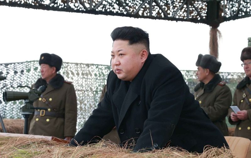 This undated picture released from North Korea's official Korean Central News Agencdy (KCNA) on January 27, 2015 shows North Korean leader Kim Jong-Un (C) inspecting a winter river-crossing attack drill of the armored infantry sub-units of the motorized strike group in the western sector of the front of the Korean People's Army (KPA) at undisclosed place in North Korea.   AFP PHOTO / KCNA via KNS    REPUBLIC OF KOREA OUT  --- THIS PICTURE WAS MADE AVAILABLE BY A THIRD PARTY  ----- AFP CAN NOT INDEPENDENTLY VERIFY THE AUTHENTICITY, LOCATION, DATE AND CONTENT OF THIS IMAGE  ----  THIS PHOTO IS DISTRIBUTED EXACTLY AS RECEIVED BY AFP    ---EDITORS NOTE--- RESTRICTED TO EDITORIAL USE - MANDATORY CREDIT "AFP PHOTO / KCNA VIA KNS" - NO MARKETING NO ADVERTISING CAMPAIGNS - DISTRIBUTED AS A SERVICE TO CLIENTS / AFP / KCNA / KNS