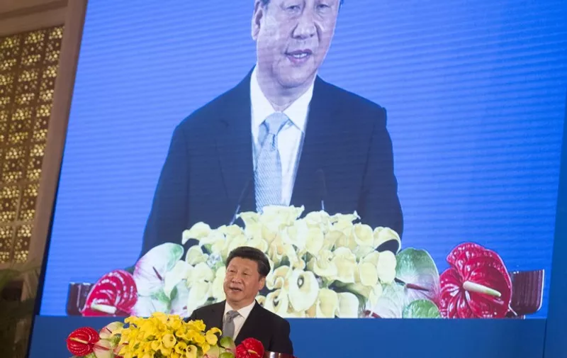 Chinese President Xi Jingping speaks during the opening session of the US - China Strategic and Economic Dialogues at Diaoyutai State Guesthouse in Beijing on June 6, 2016.
US Secretary of State John Kerry called on China to join in finding a "diplomatic solution" to rising tensions in the South China Sea, as the two countries began an annual dialog in Beijing on June 6. / AFP PHOTO / POOL / SAUL LOEB